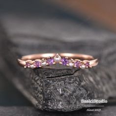 Amethyst Wedding Band Rose Gold Pearl Matching Band Custom Made Curved V Shaped Chevron Stack Ring Delicate February Birthstone Band Straight style: https://www.etsy.com/listing/802666186 To see other curved wedding band: https://www.etsy.com/listing/527716406 https://www.etsy.com/listing/547266926 ITEM INFORMATION Metal Type - Solid 14k Rose Gold Width- (Approx. 1.4mm) Side Stone -Natural Pearl & Natural Amethyst Weight - 0.25ct **Stone Replacement** Available with any other gemstones, plea Elegant Pink Amethyst Wedding Ring, Pink Amethyst Jewelry For Wedding, Dainty Rose Gold Amethyst Wedding Ring, Dainty Purple Amethyst Ring For Wedding, Dainty Purple Amethyst Wedding Ring, Dainty Amethyst Wedding Ring, Delicate Purple Jewelry For Wedding, Delicate Amethyst Wedding Ring, Dainty Purple Wedding Ring