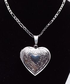 Shiny SILVER Plated Heart Shaped Photo Locket Memory Locket ☆ Measures 1 inch wide by 1 inch high ☆ Made of Stainless steel and then SILVER plated ☆ Opens up for photo insertion. ☆ A FREE Surprise is INSIDE! ☆ Strung on a BRIGHT SILVER plated stainless steel FIGARO chain 2mm wide by 50cm/ 19.7 inches long with lobster clasp. ☆ Valentine Gift ☆ Christmas Gift ☆ Gift For her | Girlfriend gift ☆ Gift for Mom ☆ Ready to ship! ☆ Free Jewelry gift box and reusable gift bag are included for easy giftin Silver Locket Jewelry, Silver Figaro Chain, Leg Art, Accessories Necklaces, Valentine Gift For Wife, Large Pendant Necklace, Memory Locket, Silver Locket, Jewelry Lockets