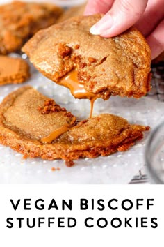 vegan biscoff stuffed cookies on a baking sheet with text overlay that reads, vegan biscoff stuffed cookies