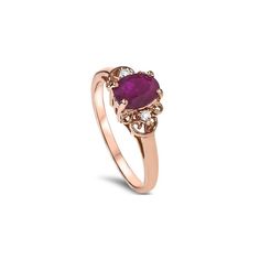 This women's ring features a genuine oval ruby and two round cut diamonds all set in rose gold. Size: 8. Color: gold/rose/ruby. Gender: female. Age Group: adult. Classic Rose Gold Ruby Ring With Diamond, Classic Rose Gold Diamond Ruby Ring, Classic Oval Rose Gold Birthstone Ring, Elegant Rose Gold Ruby Ring With Diamond Accents, Oval Rose Gold Ruby Ring With Rose Cut Diamonds, Oval Rose Gold Ruby Ring For Anniversary, Classic Oval Rose Gold Ruby Ring, Oval Ruby Ring In 14k Rose Gold, Oval Ruby Ring In Rose Gold