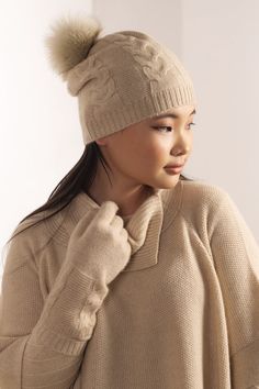 Pure cashmere hat with braid knit is made by Khanbogd Cashmere in Ulaanbaatar, Mongolia. Design: This accessory is sure to bring unrivaled coziness and heat during nippy days; the detachable pon pon and the rope knit design contributes to an impeccable sophistication, providing a timeless element of refined splendor. Colors: Beige, Dark Grey, Black Knitted Cashmere Beanie Hat, Cozy Cable Knit Hats, Cozy Cashmere Soft Knit Hat, Cable Knit Beanie For Fall, Fall Cable Knit Beanie, Cashmere Hat For Winter Cold Weather, Cozy Cashmere Beanie Hat, Winter Wool Cable Knit Hat, Winter Cashmere Hat For Cold Weather