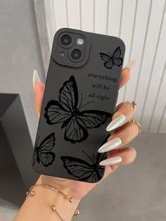 a woman's hand holding up a phone case with butterflies on it and the words, everything will be all right