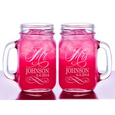 two pink mason jars with the names mr and mrs on them, sitting next to each other