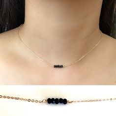 Stunning and dainty gold and black choker. Beautiful faceted jet black genuine oynx beads adorned with Swarovski rhinestone rondelle with 14k gold filled chain and clasp- extremely high quality! Quality crafted to last, handmade with care using no open jump rings. Custom size available, made 15" with 2" adjustable clasp. Each made to order, customizations welcome.Also available in sterling silver, without the rhinestones (5 oynx beads instead of the rhinestone rondelle), or as a bracelet! Minimalist Black Beaded Jewelry, Minimalist Black Bead Choker Jewelry, Minimalist Black Beads Choker, Gold Onyx Necklace With Adjustable Chain, Adjustable Onyx Choker Necklace, Elegant Black Gold-plated Chain Necklace, Adjustable Black Onyx Necklace, Elegant Onyx Hand-strung Necklaces, Black Choker Necklace