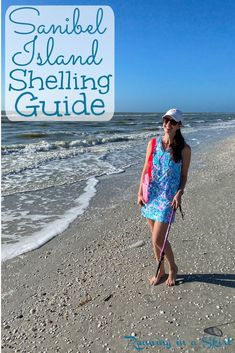 a woman standing on top of a sandy beach next to the ocean with text overlay that reads sanibe island shelling guide