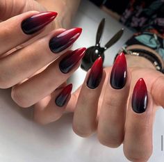 Trick or Treat Yo' Self: The Ultimate Halloween Nail Art Inspiration Unique Acrylic Nails Black, Simple Goth Nail Ideas, Vampy Nails Almond, Devil Nails Designs, Goth Gel Nails, Bruja Nails, Devil Nails, Vampy Nails, Burgundy Acrylic Nails