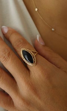 The ultimate statement ring for onyx lovers.Custom made to order. Please allow 1-2 weeks for delivery. Elegant Turquoise Gemstone Ring For Formal Occasions, Elegant Turquoise Ring, Elegant Turquoise Open Ring For Promise, Elegant Open Turquoise Ring For Anniversary, Elegant 14k Gold Turquoise Ring For Formal Occasions, Elegant Open Turquoise Ring, Elegant Open Ring With Black Enamel, Elegant 14k Gold Turquoise Ring, Elegant 14k Gold Turquoise Ring For Promise