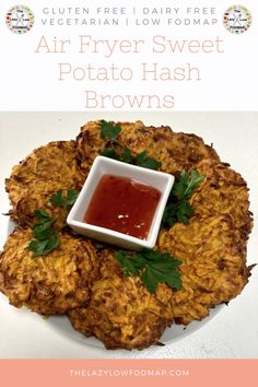 an air fryer sweet potato hash browns with ketchup and parsley on top