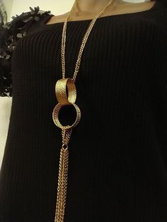 We source the most stunning, highest quality vintage jewelry pieces around that pay homage to the decorative, jewelry arts. This authentic, 1960s, gold-plated double chain, tassled necklace features a stylized, double-looped, structured focal that is as cool today as it was way back in the 60s! It's super long, 29 inches, sautoir length and makes a statement! Focal measures 4" long. It's a definite art piece. So cool! At Zalmanovitz & Bunnell, we believe you should WEAR YOUR ART. Vintage Statement Jewelry, Statement Jewelry Necklace, Double Chain Necklace, Double Chain, Wedding Jewellery Necklace, So Cool, Vintage 1960s, Wedding Necklace, Jewelry Art