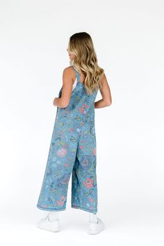 The floral embroidered women's denim overalls are a must have for the Spring/Summer months. Rarely do you get to sport an outfit which will entail endless compliments like these bib overalls. They feature an oversized and loose fit with adjustable straps and distressed details. Model Measurements: Hips 34” Waist 25” Bust 32” Height 5’6.5, wearing a size small 100% Cotton Measurements S: Hips: 42"| Length: 44.5" (taken from top of front of overalls to ankle cuff) M: Hips: 46" | Length: 45" (taken Patterned Overalls, Floral Overalls, Aesthetic Overalls, Womens Denim Overalls, Diy Clothes Design, Floral Denim, Bib Overalls, Embroidered Clothes, Cute Simple Outfits