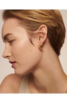 A half-hoop silhouette gives a classic look from the front and a modern crescent shape from the side of these 18-karat gold-vermeil hoops. Exclusive US retailer 3/4" drop; 1/4" width Post back Sterling silver/recycled 18k-gold plate Imported This brand is certified with the Butterfly Mark, which identifies luxury brands that adhere to social and environmental best practices This brand meets Nordstrom Responsible Brands criteria: brand adheres to responsible social and environmental practices Elegant Crescent Huggie Earrings, Modern Crescent Yellow Gold Hoop Earrings, Modern Gold Semi-circle Jewelry, Elegant Crescent Gold Plated Hoop Earrings, Elegant Crescent Hoop Earrings For Everyday, Minimalist Crescent Hoop Earrings, Modern Yellow Gold Semi-circle Jewelry, Everyday Gold Crescent Hoop Earrings, Gold Crescent Hoop Earrings For Everyday