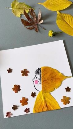 a child's drawing of a girl surrounded by leaves