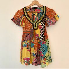 New Melissa Paige Short Sleeve V-Neck Blouse Top Size S Shirred Stretch Fit & Flare Super Cute! 100% Polyester Vibrant V-neck Blouse For Beach, Colorful Summer Top With Yellow Pattern, Yellow Tops With Colorful Pattern For Summer, Vibrant V-neck Blouse In Multicolor Print, Vibrant Multicolor Print V-neck Blouse, Vibrant V-neck Multicolor Print Blouse, Vibrant V-neck Blouse With Multicolor Print, Vibrant V-neck Blouse With Vibrant Print, Yellow Summer Top With Vibrant Print