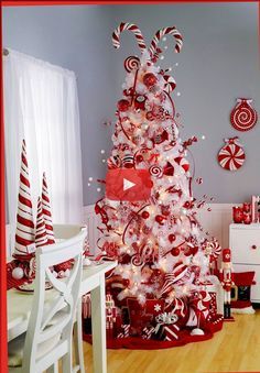 a christmas tree decorated with red and white candy canes