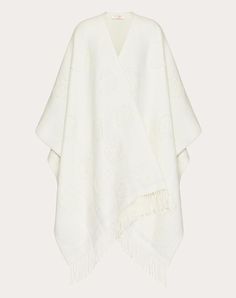 Valentino Flower poncho in wool blend with lurex details -Composition: 79% virgin wool, 14% polyamide, 3% viscose, 2% metallic fibre, 2% cashmere -Dimensions: 140 x 160 cm / 55.1 x 63.0 in. -Dry clean -Made in Italy Elegant Oversized Wool Poncho, Luxury Cashmere Shawl For Winter, Elegant Wool Poncho Shawl, Elegant Wool Shawl Poncho, Luxury Winter Poncho, Lurex Sweater, Cashmere Poncho, Latest Sweater, Metallic Sweater