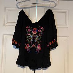 Nwt Women’s Umgee Off Shoulder Black Embroidered Top Size Small. Never Worn. Comes From Pet Free/Smoke Free Home. Black Embroidered Hem Top For Summer, Casual Black Embroidered V-neck Top, Casual Black Top With Embroidered Hem, Black V-neck Top With Floral Embroidery, Casual Black Embroidered Top For Spring, Black Embroidered V-neck Top For Summer, Black V-neck Embroidered Top For Summer, Spring Black V-neck Embroidered Top, Black V-neck Embroidered Top For Spring