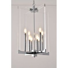 four light chandelier with clear glass panels and metal rods, hanging from the ceiling