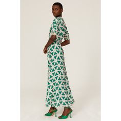 Green printed viscose (100% Viscose). Lining (100% Polyester). Hourglass. V-neck. Short sleeve. Back zipper closure. 56" from shoulder to hemline. Imported. Printed V-neck Rayon Maxi Dress, Printed Rayon V-neck Dress, Green Viscose V-neck Maxi Dress, Green V-neck Viscose Maxi Dress, Chic Printed Rayon Maxi Dress, Printed Rayon Midi Dress With Short Sleeves, Printed Rayon V-neck Maxi Dress, Printed Rayon Maxi Dress With V-neck, Patterned Viscose Dresses For Summer