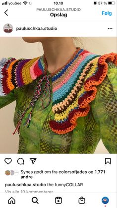 a woman is wearing a colorful crochet top and has her hands on her hips