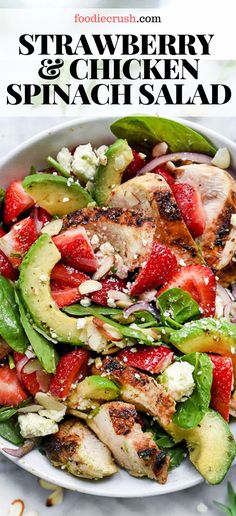 strawberry chicken and spinach salad on a white plate with the title text overlay