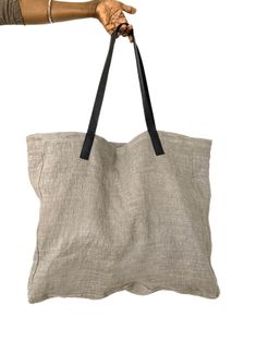 Tote bag made from 100% cotton fabric with a beautiful rustic weave effect, a fabric from recovery of end of factory roll. Before being cut, it was dyed with a natural dye made from plants and gray clay in my workshop. It is a light bag, a simple and practical maxi bag Handmade handles in black recycled leather. Limited series, available in 3 colors in the store, ecru, khaki and cement gray, one per color. Each model is unique, creation and handmade in my workshop. Height: 41 cm - 16.14 inches W Large Beach Bags, Reversible Skirt, Ethnic Bag, Natural Dyeing, French Designer, Grey Beige, Recycled Leather, Beach Tote Bags, Grey And Beige