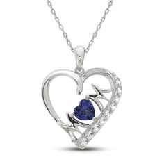 This beautiful and sentimental necklace for Mom features a heart-shaped pendant embellished with sparkling round-cut white lab-created sapphires along one side. The word 'MOM' graces the inside, with a gorgeous heart-cut blue lab-created sapphire in the center. The sterling silver pendant hangs from an 18-inch cable chain and secures with a lobster clasp. Heart Cut Sapphire Birthstone Jewelry, Sapphire Heart Cut Birthstone Jewelry, Heart Cut Gemstone Jewelry For Mother's Day, Mother's Day Heart Cut Gemstone Jewelry, Mother's Day Gemstone Heart Cut Jewelry, Mother's Day Jewelry With Heart Charm And Cubic Zirconia, Mother's Day Cubic Zirconia Heart Charm Jewelry, Sapphire Heart Pendant Birthstone Jewelry, Blue Necklace For Mother's Day Gift