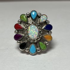 This Stunning Sterling Silver Ring Showcases A Beautiful Southwestern Style With An Array Of Colorful Gemstones. The Ring Is A Size 8.5 And Crafted With 925 Metal Purity. The Opal Is The Main Stone, Complemented By A Variety Of Other Gemstones, Making This Ring A Unique And Eye-Catching Addition To Any Jewelry Collection. The Multicolor Design Is Perfect For Those Who Appreciate The Beauty Of Gemstones And Want To Add A Touch Of Ethnic And Regional Style To Their Wardrobe. This Ring Is Perfect F Adjustable Multicolor Turquoise Ring In Southwestern Style, Southwestern Concho Jewelry, Multicolor Gemstone Southwestern Rings, Multicolor Southwestern Style Turquoise Ring In Sterling Silver, Multicolor Vintage Turquoise Ring, Vintage Multicolor Turquoise Ring, Southwestern Multicolor Turquoise Sterling Silver Ring, Bohemian Turquoise Concho Ring, Multicolor Southwestern Sterling Silver Turquoise Ring