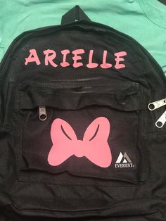 We can put your child's name on their backpack and personalize it with their favorite cartoon character. The picture shows a "Minnie mouse" bow. Cute Minnie Mouse Backpack For School, Minnie Mouse Backpack For Back To School, Minnie Mouse Standard Backpack For School, Disney Minnie Mouse Standard Backpack, Minnie Mouse Standard School Backpack, School Backpack With Minnie Mouse Design, Back To School Minnie Mouse Backpack, Back To School Minnie Mouse Standard Backpack, Minnie Mouse Bow