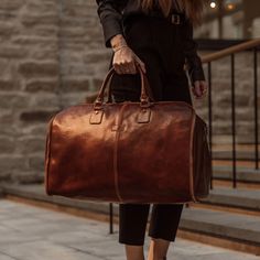 Certified Italian vegetable-tanned leather – choose our lifetime-lasting sustainable full-grain leather over cheaper, short-lived alternatives. Garment Duffle Bag, Leather Garment Bag, Early Morning Yoga, Travelling Abroad, Luggage Bags Travel, Elegant Attire, Classy Design, Luggage Sizes, Solid Brown