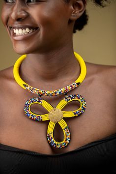 Unique African Maasai Handcrafted Beaded Necklace with an Elegant Look and Brilliant Finish. Buy Multiple Items and pay shipping for 1 item only- The rest ships Free. (No Limits on the number of Multiple items). With a faster delivery time of 3 days via DHLExpress, Worldwide. Ordinary/Standard Shipping also available upon request. We Custom Make to Suit Your Taste. Available In All Colors and Sizes. For wholesale please chat me up for discounted rates. African jewelry for women. Kenya Beaded Nec Yellow Beaded Necklaces With Gold Beads, Bohemian Yellow Beaded Necklaces With Gold Beads, Yellow Beaded Necklace With Tiny Beads For Gift, Yellow Beaded Necklace With Tiny Beads As Gift, Unique Yellow Beads For Jewelry Making, Yellow Beaded Necklaces For Jewelry Making, Yellow Tiny Beads Necklace As Gift, Traditional Yellow Beaded Necklaces With Polished Beads, Traditional Yellow Beaded Necklace With Polished Beads