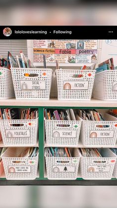 several baskets are stacked on top of each other in front of a bulletin board and bookshelf