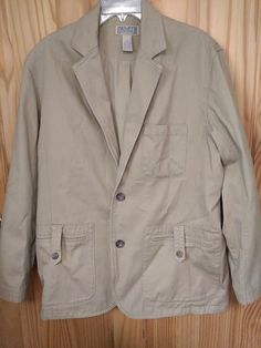 Duluth Trading Co Canvas 2-Button Jacket Blazer Khaki Mens Size L. Pre own Vintage Khaki Cotton Blazer, Khaki Cotton Button-up Sport Coat, Khaki Cotton Blazer With Lapel Collar, Khaki Blazer With Buttoned Pockets For Work, Casual Khaki Blazer With Pockets, Utility Blazer With Lapel Collar And Buttons, Utility Blazer With Buttons And Lapel Collar, Casual Khaki Blazer With Buttons, Classic Khaki Blazer With Flap Pockets