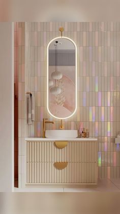 a bathroom with a sink, mirror and lights on the wall in it's corner