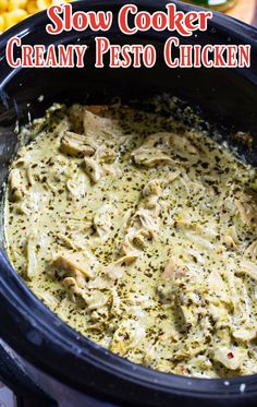 slow cooker creamy pesto chicken in the crock pot with text overlay