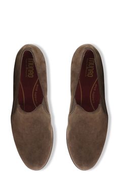 Elastic insets and contoured cushioning are sure to keep you comfy in this smart leather loafer. Removable, cushioned insole with arch support Leather and textile upper/synthetic lining and sole Imported Classic Suede Flat Slip-ons, Business Casual Slip-ons With Ortholite Insole, Comfortable Formal Slip-ons With Almond Toe, Medium Width Suede Slip-on Loafers, Business Casual Slip-ons With Suede Lining, Classic Slippers With Removable Insole, Classic Slip-on Slippers With Removable Insole, Leather Slippers With Cushioned Footbed And Almond Toe, Comfortable Slip-on Loafers With Branded Insole