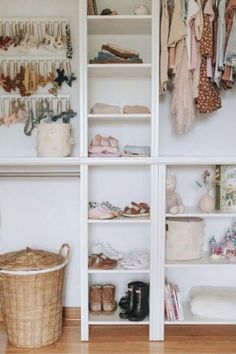 an organized closet with clothes, shoes and other items on shelves next to a basket