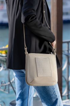 This crossbody bag in striking mixed materials is perfectly compact but with plenty of capacity and functionality built-in. Added perk? The adjustable crossbody strap keeps your hands free for days on the go. Crossbody Strap, The Go, Handbags