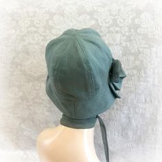 1920's Style Linen Hat with Pleated Brim and Flower | The Polly Cloche – Boston Millinery Fitted Brimmed Bonnet For Summer, Fitted Bonnet Cap For Spring, Adjustable Bonnet For Spring, Adjustable Green Cloche Hat, Vintage Bonnet With Adjustable Short Brim, Vintage Adjustable Bonnet With Short Brim, Vintage Short Brim Bonnet With Adjustable Fit, Spring Green Adjustable Cloche Hat, Adjustable Brimmed Spring Bonnet