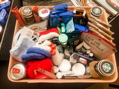 a basket filled with lots of items on top of a table