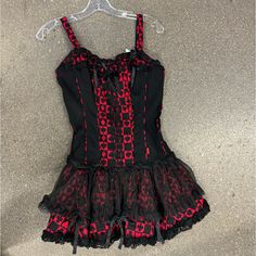 Tripp Nyc Size Medium Wash Wear Light Fading Which Is Very Normal For This Brand Vintage Queen Of Hearts Tutu Dress Ace Of Spades Black Red Goth Retro Red Mini Dress For Halloween, Gothic Red Summer Mini Dress, Red Gothic Mini Dress For Summer, Red Ruffle Mini Dress For Costume Party, Red Ruffled Mini Dress For Costume Party, Red Gothic Dress For Summer, Sleeveless Red Corset Dress With Ruffles, Red Fitted Gothic Mini Dress, Red Fitted Gothic Dress