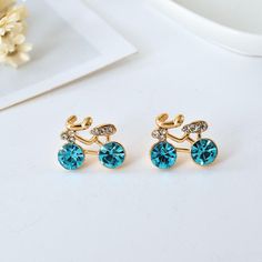 These stunning golden crystal stud earrings are the perfect piece to add some edge to your look. In your choice of 3 main crystal colors available to match your desired outfit. Every piece is beautifully handcrafted in and comes packaged in a smart velvet bag. ✔️ FREE Worldwide shipping, we ship to over 250 Countries! ✔️ 316L Stainless Steel, AAA+CZ Stone ✔️ Scratch-resistant ✔️ Weight 5g ✔️ SUITABLE FOR ANY OCCASION: Popular among Women and girls, fashion design, easy to match any clothes, suit Trendy Crystal Earrings As Gift, Trendy Crystal Earrings For Gifts, Single Crystal Earring As A Gift, Metal Clip-on Crystal Earrings For Gift, Metal Clip-on Crystal Earrings As Gift, Crystal Drop Clip-on Earrings For Gifts, Crystal Clip-on Earrings As A Gift, Gold Crystal Clip-on Earrings For Gift, Women Cycle