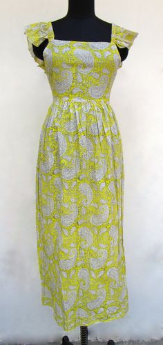 "ITEM DESCRIPTION yellow big paisley printed cotton long maxi dress - square neckline with back strap maxi dress - short sleeve boho maxi dress Features: short sleeve, square neck, Long dress Material: Cotton cambric Fabric: 100% cotton soft light weight ethnic print fabrics  Sleeve Length = 5 inch For more sizes & their measurement, please refer our below chart to understand the sizes variations available with us For your size requirement, please mention your size in seller note at the time of buying. SIZE MEASUREMENT  BUSTLENGTHSHOULDER XXS34 inch51 inch13.5 inch XS36 inch51 inch14 inch S38 inch51 inch14.5 inch M40 inch51 inch15 inch L42 inch51 inch16 inch XL44 inch51 inch16.5 inch 2XL46 inch51 inch17 inch 3XL48 inch51 inch18 inch   Company Return Policy:  Please write for more informati Square Neck Long Dress, Summer Yellow, Ethnic Print, Rayon Dress, Dress Out, Block Printing Fabric, Boho Maxi, Boho Maxi Dress, Square Necklines