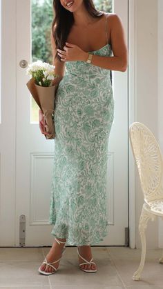 This green floral gathered maxi dress offers a dreamy, feminine look with its delicate leaf print and flattering open-back design. Featuring a side zipper and lined construction for a perfect fit, it’s the ultimate choice for elegant occasions. Green Floral Print Prom Dress, Green Spring Maxi Dress For Prom, Green Maxi Dress For Garden Party, Chic Green Floral Print Maxi Dress, Floor-length Green Maxi Dress With Floral Print, Chic Green Maxi Dress With Floral Print, Green Floor-length Floral Maxi Dress, Green Floral Print Maxi Dress For Wedding, Feminine Fitted Green Maxi Dress