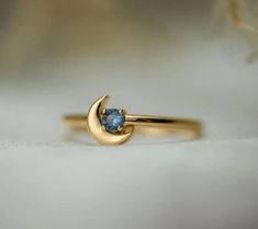 Celestial Blue Topaz Ring Gift, Celestial Blue Topaz Ring For Gift, Blue Moonstone Ring In 14k Gold, Blue Round Moonstone Ring In 14k Gold, Blue Moonstone Ring In 14k Gold For Gift, Half Moon Ring, Blue Topaz Gemstone, Moon Ring, Natural Blue Sapphire