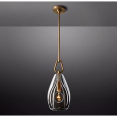 a small glass light fixture hanging from a metal ceiling lamp with an antique brass finish