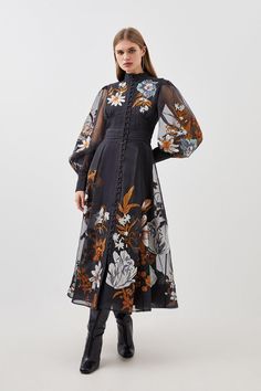 Crafted With Floral Applique Motifs, This Refined Organdie Dress Exudes Understated Elegance. Featuring A High Collared Neckline With Cascading Fabric Buttons Through The Front, While Sheer Balloon Sleeves Add An Ethereal Element. Finished With A Full Skirt And Midi Length, Pair With Barely-There Heels For Elegant Formal Wear.Floral Appliqueorgandiebutton Detailingballoon Sleeves Organdie Dress, Midi Long Sleeve Dress, Casual Cocktail Dress, Western Embroidery, Petite Midi Dress, Latest Maxi Dresses, Chic Cocktail Dress, Style Aesthetics, Petite Maxi Dress