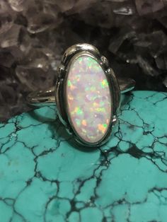 *7x14 mm lab created opal ring *Sterling Silver *Free Shipping *Handcrafted In USA*Jewelry ship in Gift box *Cabochon made vary in color All components are solid .925 silver. Thank You For Your Looking ,And Check Out More Items In My Etsy Shop For More Great Deals, Also We Add More Jewelry To Etsy Shop regularly ❤❤❤PLEASE check their dimensions, before setting the order.►►► NOTE◀◀◀-Once the parcel gets shipped out, it is usually needed 3-6 business days for every where in USPlease keep in mind t Silver Oval Opal Ring Stamped 925, Oval Silver Opal Ring Stamped 925, Oval Opal Ring Stamped 925, Spiritual Oval Opal Ring Stamped 925, Handmade Oval White Opal Ring, Handmade White Oval Opal Ring, Spiritual White Oval Opal Ring, Silver Oval Opal Ring Untreated, Untreated Oval Opal Ring In Silver