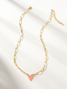 Our best-selling heart necklace, featuring a paperclip chain, now comes in even more colors! This chain and pendant necklace is a sweet addition to your daily necklace set. For a full look, layer the Enamel Heart Necklace in the color of your choice with your favorite gold chain necklaces. Please note that the off white color has pink undertones and in certain lighting it may look more pink than white. | Gold Paperclip Necklace with Blush Enamel Heart Pendant Necklace | Women's Jewelry by Uncomm Daily Necklace, Gold Chain Necklaces, Uncommon James, Paperclip Necklace, Chain And Pendant, Heart Chain, Gold Heart Necklace, Pink Enamel, Full Look