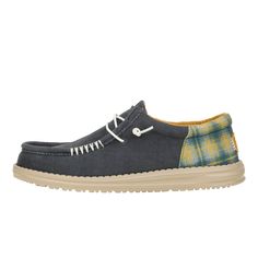 HEYDUDE | Men's Casual | Wally Funk Waffle - Navy Plaid | Size 9 - Hit the holiday in style with the Wally Funk Waffle. This flannel plaid top and waffle-knit lining are giving all the comfy, cozy vibes this holiday season. Travel-ready with a lightweight flexible outsole, these kicks are ready for any seasonal soiree.Shoe Specs: Slip-On Stretch Lace Plaid and brushed twill top Waffle-knit lining Comfort cushioned ankle collar Elastic laces Easy-on system Travel ready Removable foam insole Upper Casual Low-top Canvas Shoes With Rubber Waffle Outsoles, High-top Skate Shoes With Rubber Waffle Outsoles, Lace-up Walking Shoes With Rubber Waffle Outsoles For Outdoor, Urban Low-top Skate Shoes With Rubber Waffle Outsoles, Mid-top Skate Shoes With Rubber Waffle Outsoles, School Uniform Shoes, School Uniform Kids, Wide Shoes, Elastic Laces