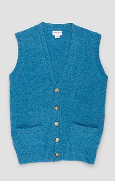 For those with an eye for classic style, sleeveless cardigans are an essential layering piece. New for this season, we've updated this classic knit with Shetland wool for a robust yet relaxed vibe. Light horn buttons add a touch of fun contrast, and 2 front pockets offer some storage space. The length is also cut slightly shorter so it can be paired with high-rise trousers for a flattering look. Harrington Jacket, Shetland Wool, Sleeveless Cardigan, Classic Outfits, An Eye, Ocean Blue, Layering Pieces, Blue Ocean, Horn